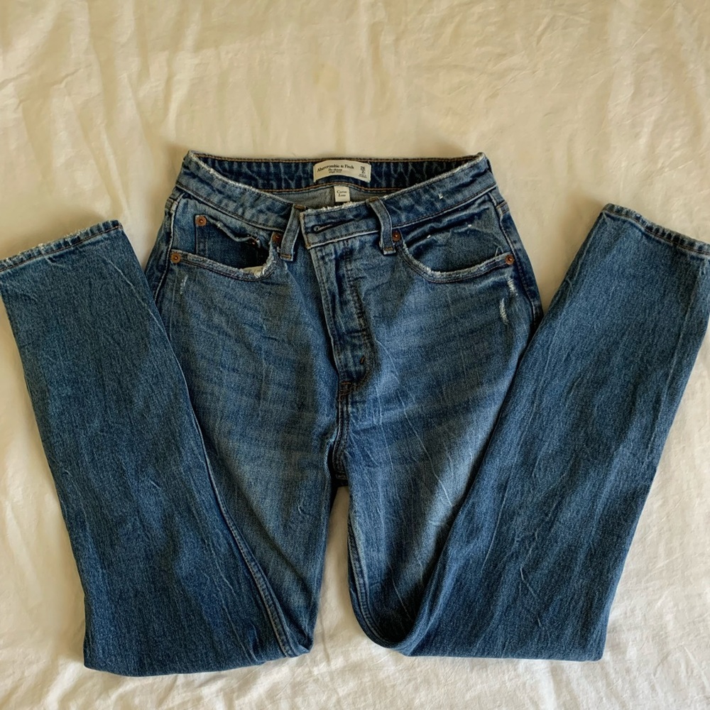 High rise, skinny curve love jeans, zip waist.